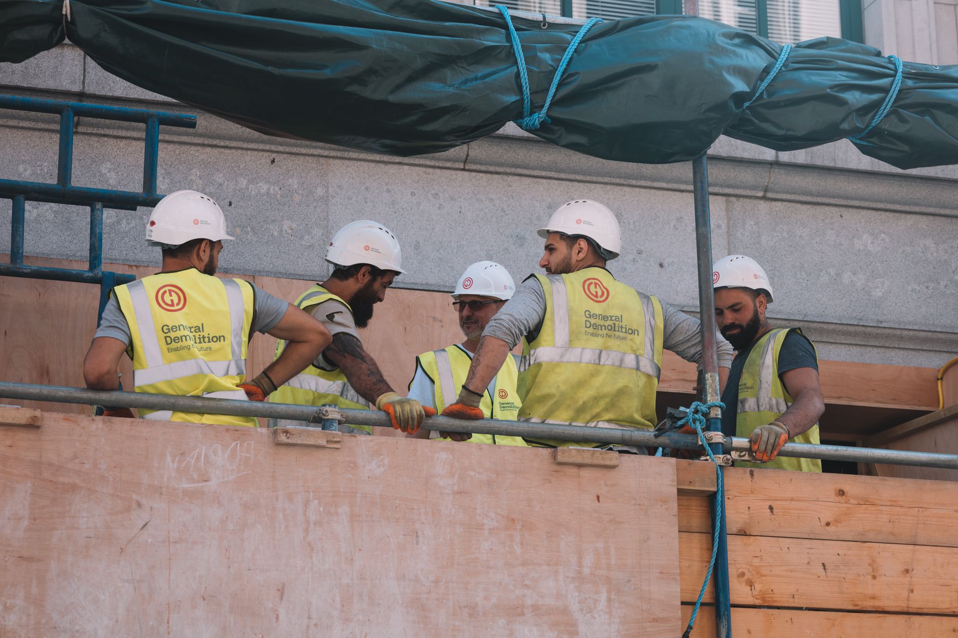 Construction crew working together on a city job site